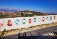 تصاویر شهدای حزب‌الله بر دیوار حائل میان لبنان و فلسطین اشغالی+فیلم