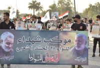 تظاهرات حمایتی از الحشد الشعبی در بغداد با تصاویر شهیدان سلیمانی و المهندس